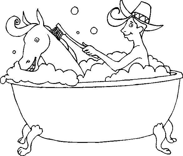   Ковбой моет свою лошадь
