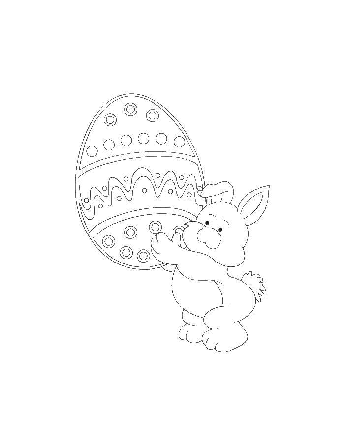   Кролик несет пасхальное яйцо